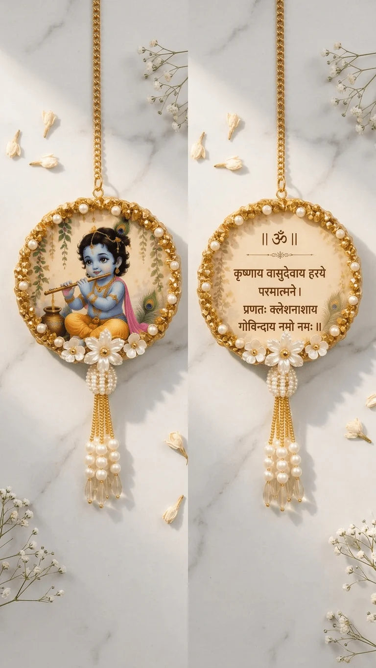 Circular golden resin wall hanging, featuring Baby Krishna and a Sanskrit mantra, adorned with pearls and a pearl tassel.
