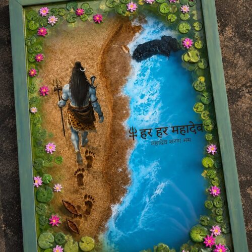 Handcrafted resin art frame depicting Lord Shiva walking on a sandy beach next to a blue ocean, surrounded by pink lotus flow